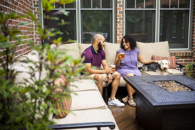 family on patio with pest control services