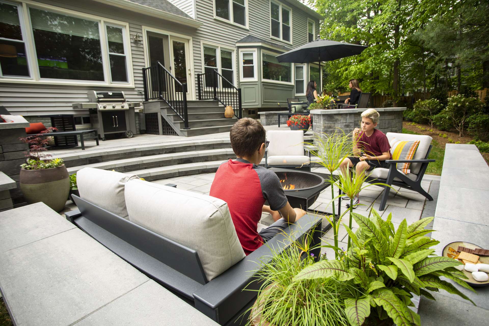 family enjoying quality time outdoors on a nice patio