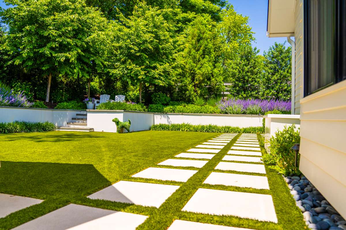 nice stepper walkway in a backyard lawn