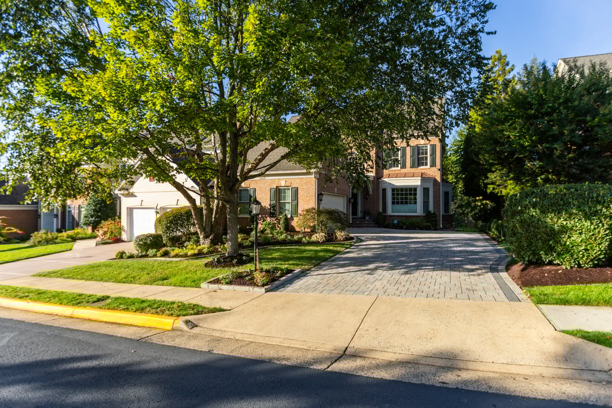 front yard paver driveway shade tree