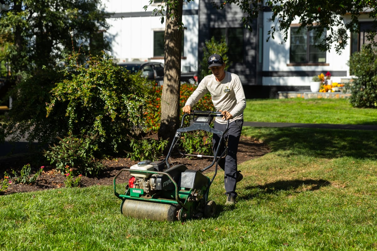 maintenance crew team lawn aeration fall 7