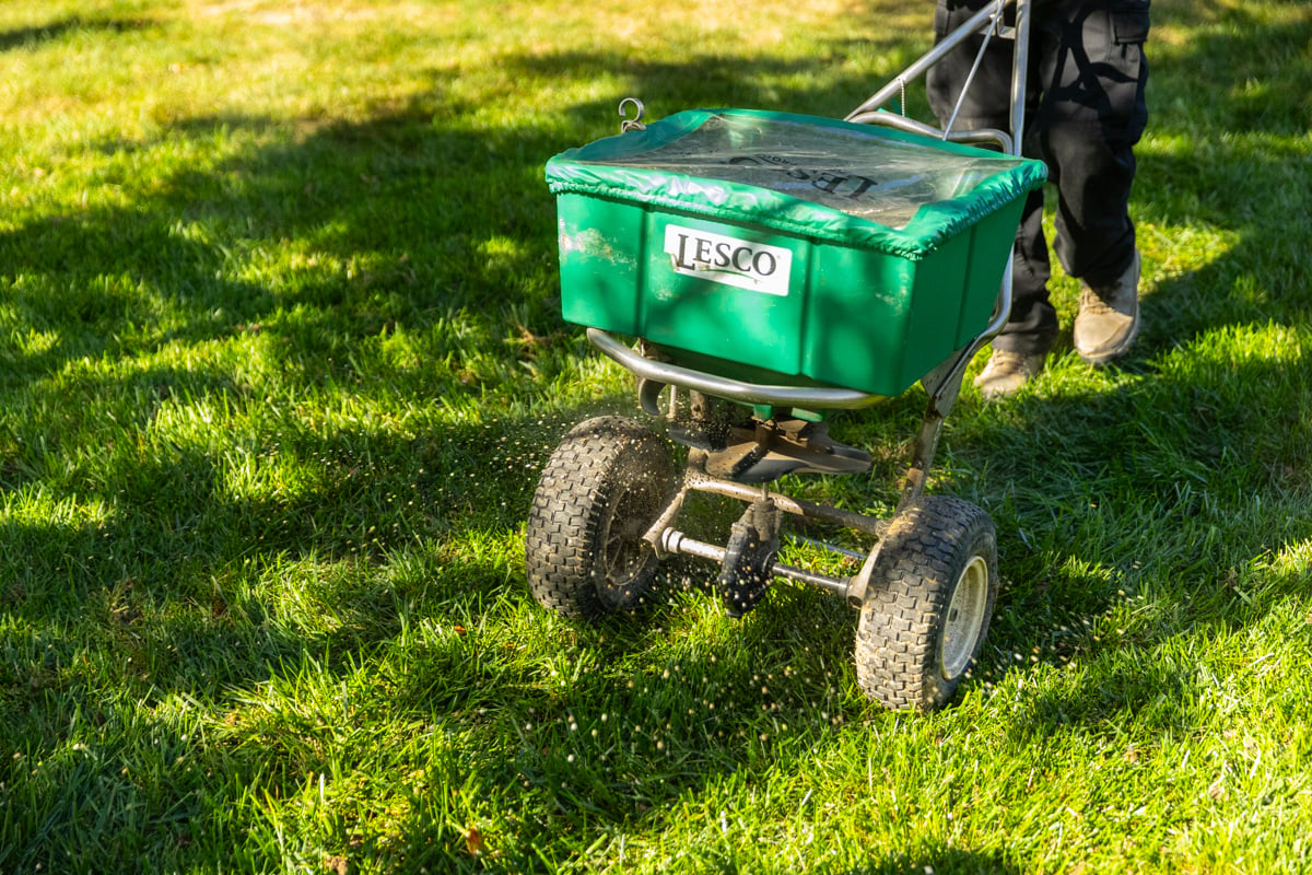 maintenance crew team lawn care fertilizer spreader 4