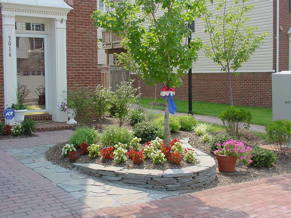 brick walkway and landscape plantings