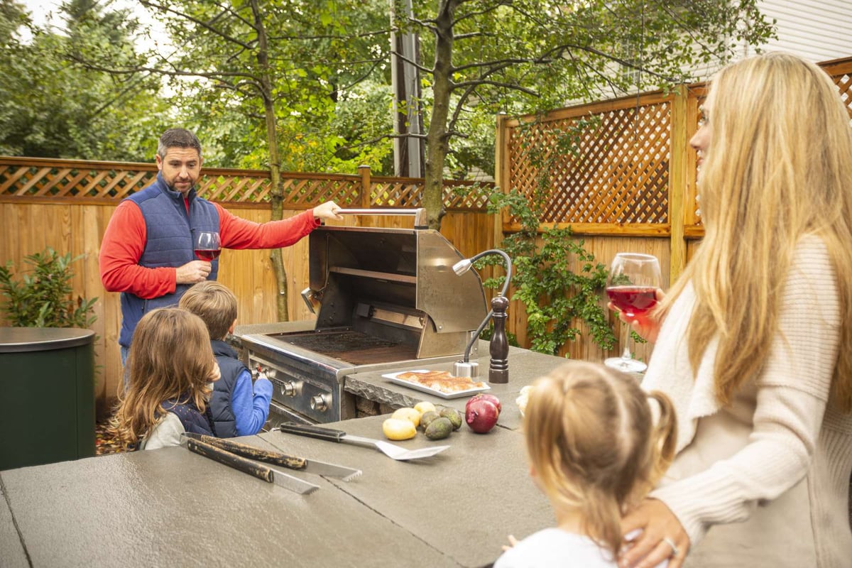 family barbeque on grill and built in kitchen