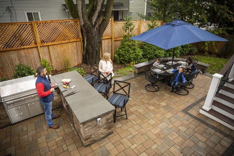 Kingstowne customer paver patio dining outdoor kitchen