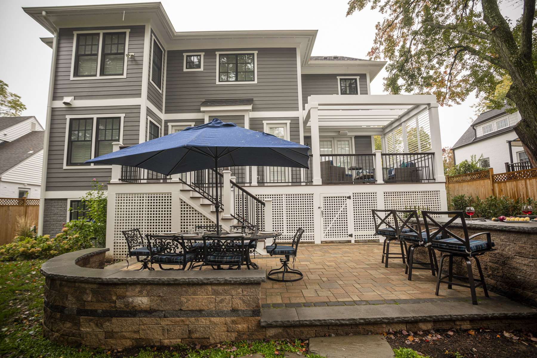Kingstowne paver patio deck seating outdoor kitchen yard