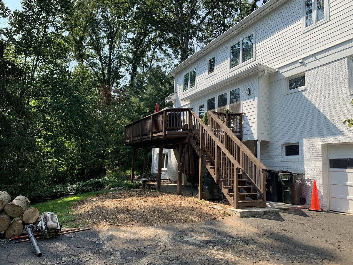 old deck with cramped landscape 