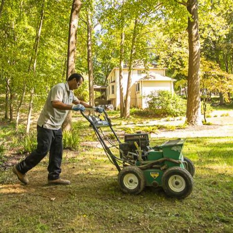 Kingstowne team lawn care slice seeder power seeding