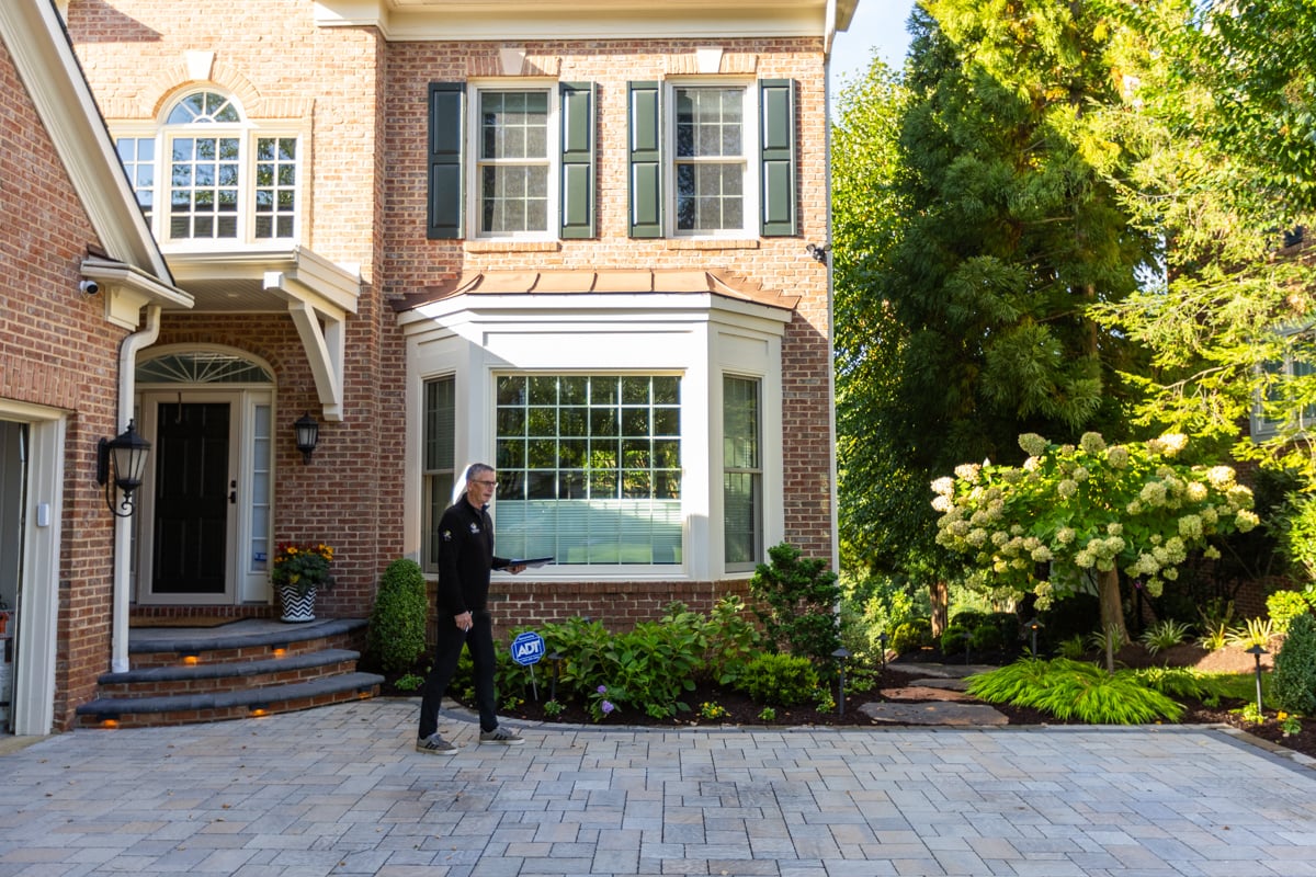 account manager landscape designer inspecting property 6