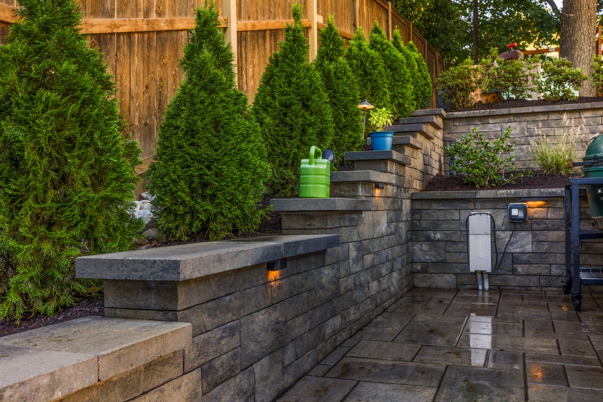 patio with retaining wall and border plantings
