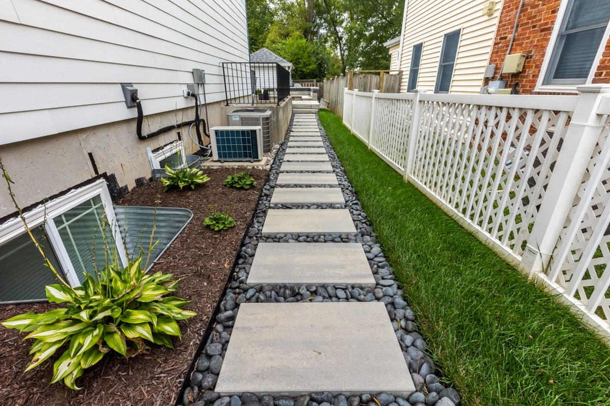 landscape design slab walkway turf fence border planting bed cloutier residence 2