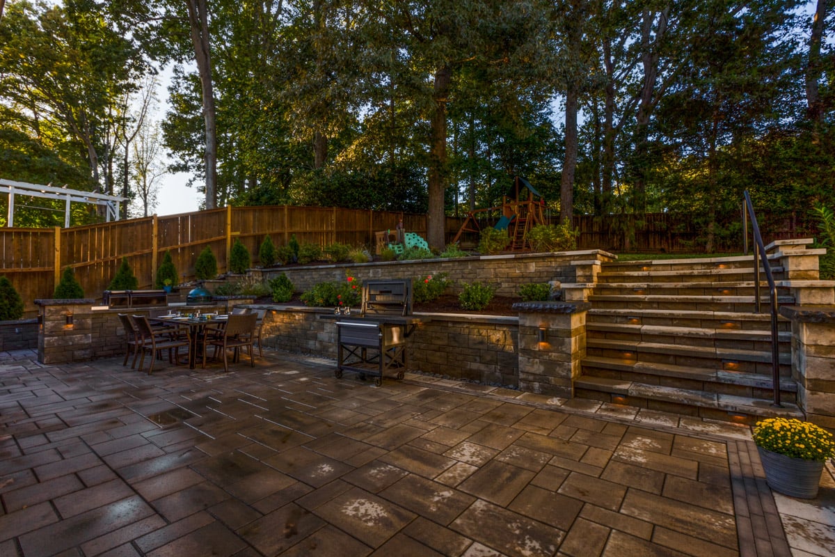 landscape design stone stairs retaining walls paver patio woodline rood residence 2