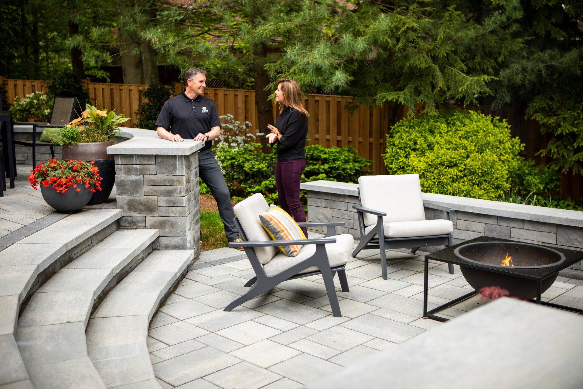 landscape designer and customer discussing a project