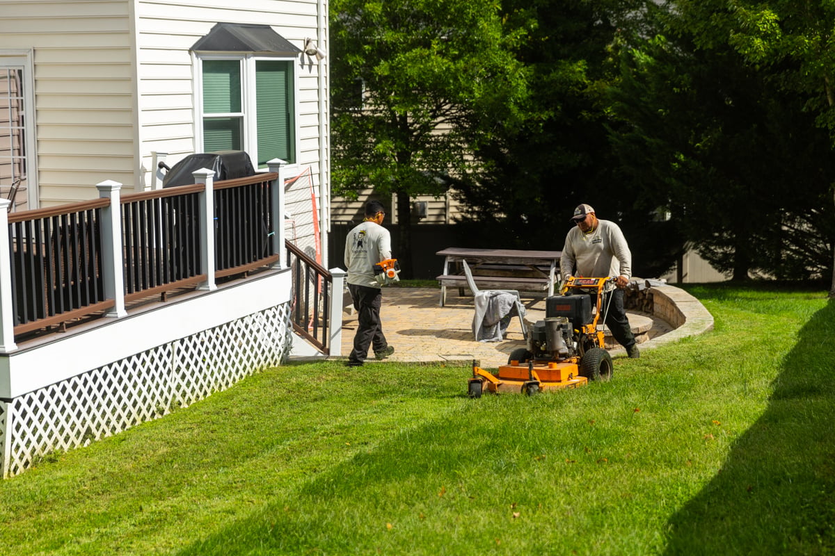 maintenance crew mowing trimming lawn fall edging 16