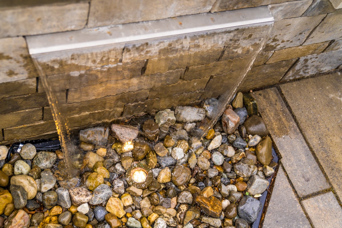 pondless waterfall feature with inset lighting
