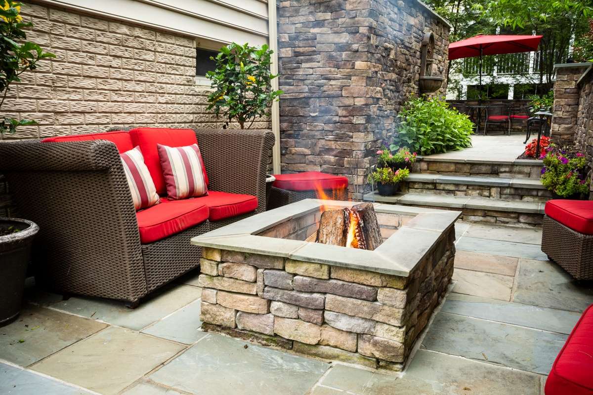 fire pit on patio with furniture