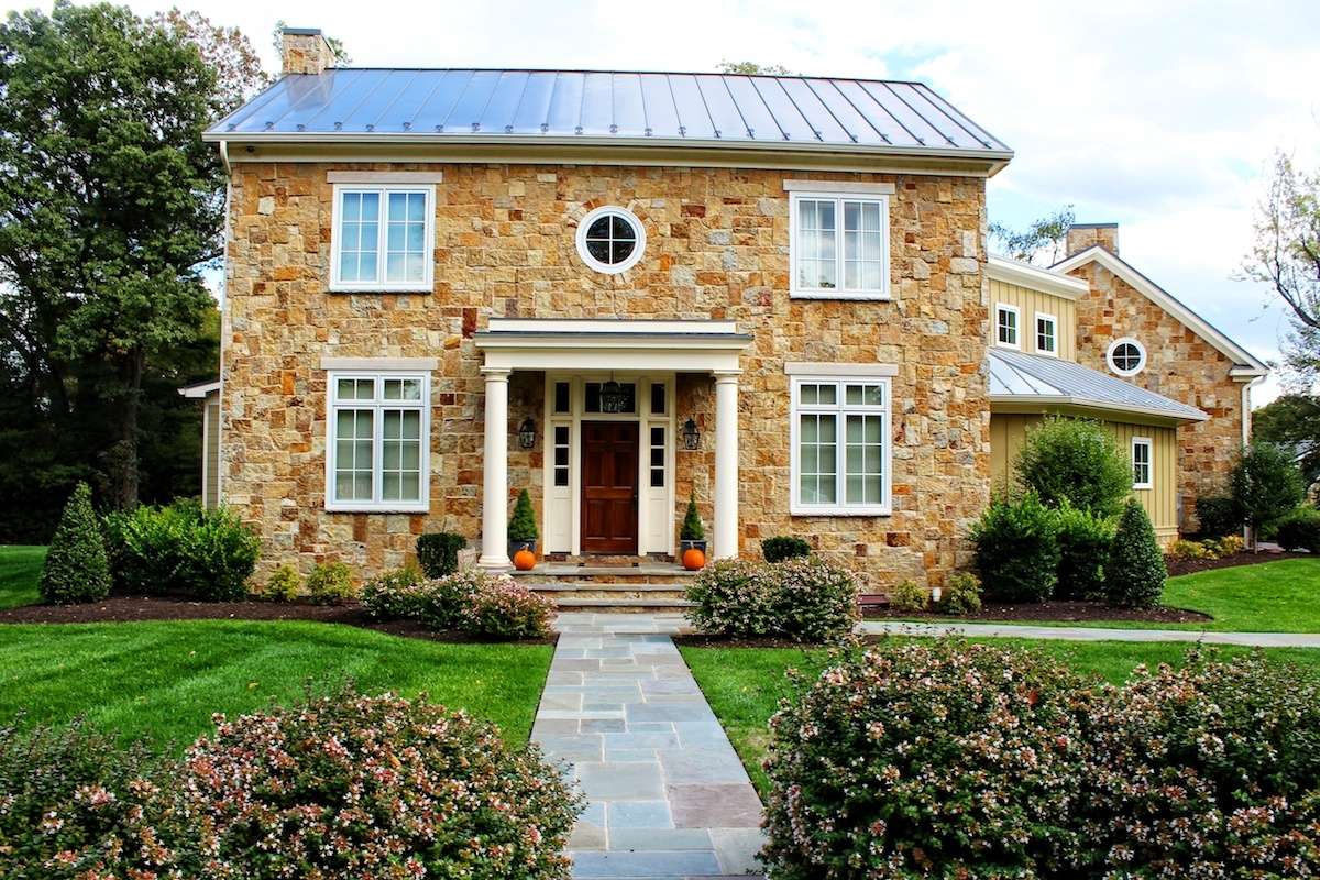 Front yard landscape with paver walkway