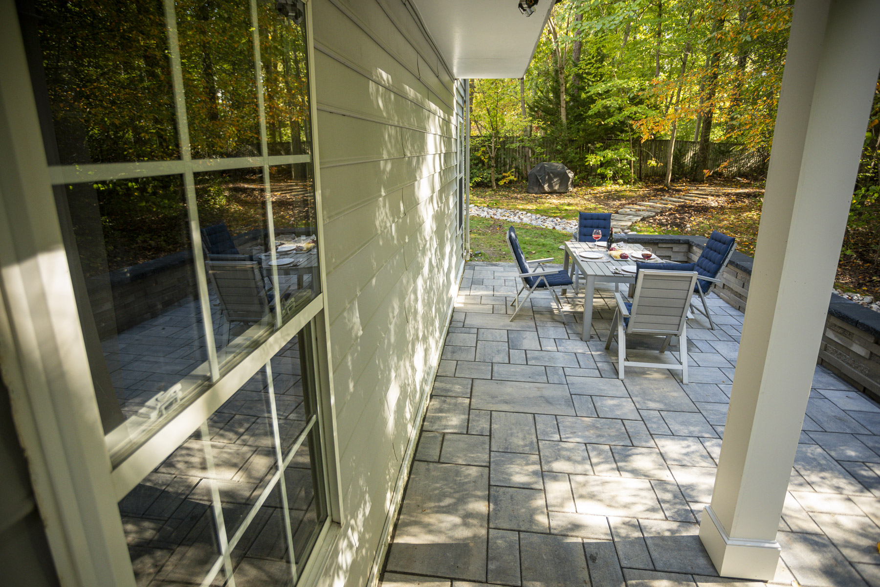 Kingstowne paver patio retaining wall seating dry creek bed stepping stones