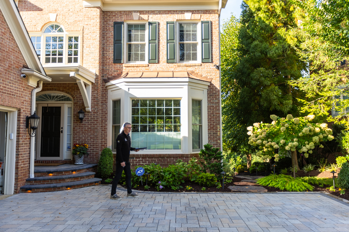 landscape designer reviewing a nice northern virginia landscape