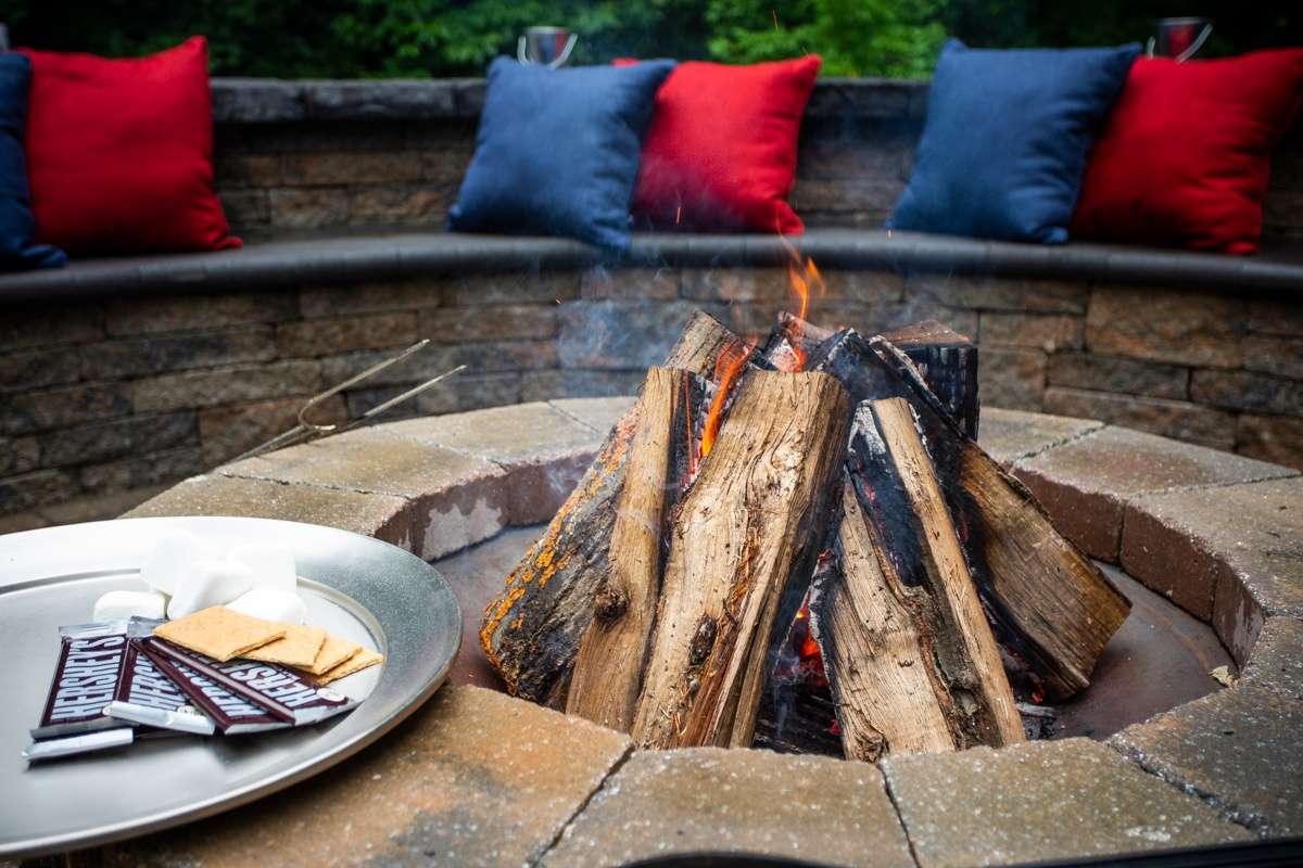 Fire pit on patio with s'mores